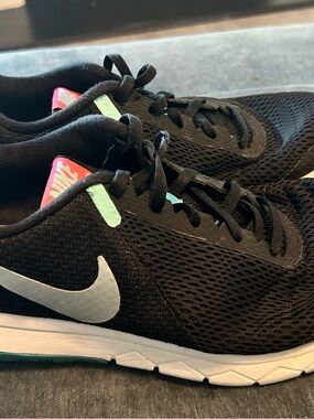 Nike Women’s Black Mesh Running Shoes with Mint and Coral Accents